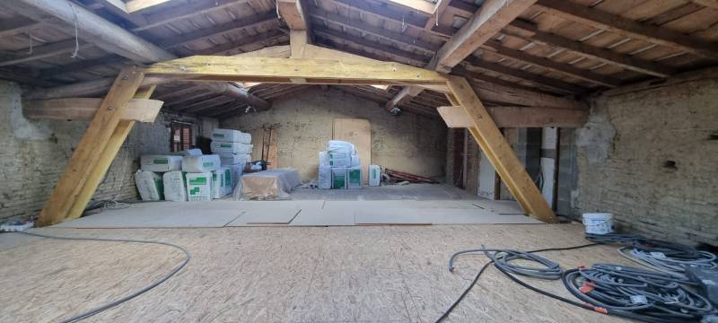 Modification de ferme en charpente traditionnelle par les 2 charpentiers