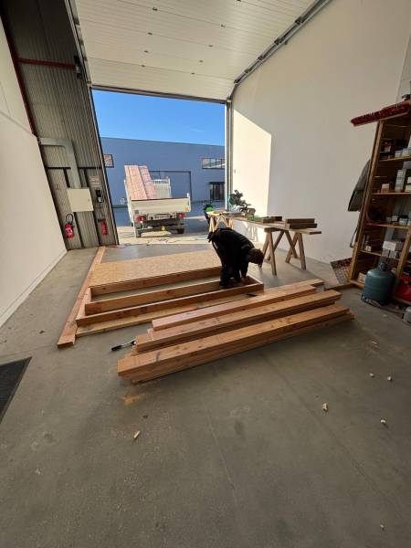 Taille de mur ossature bois dans le dépôt les 2 charpentiers RGE a Toulouse 